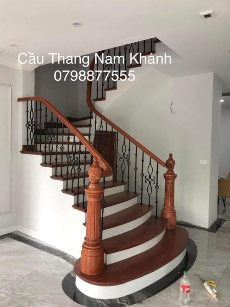 Mẫu cầu thang sắt tay vịn gỗ 11